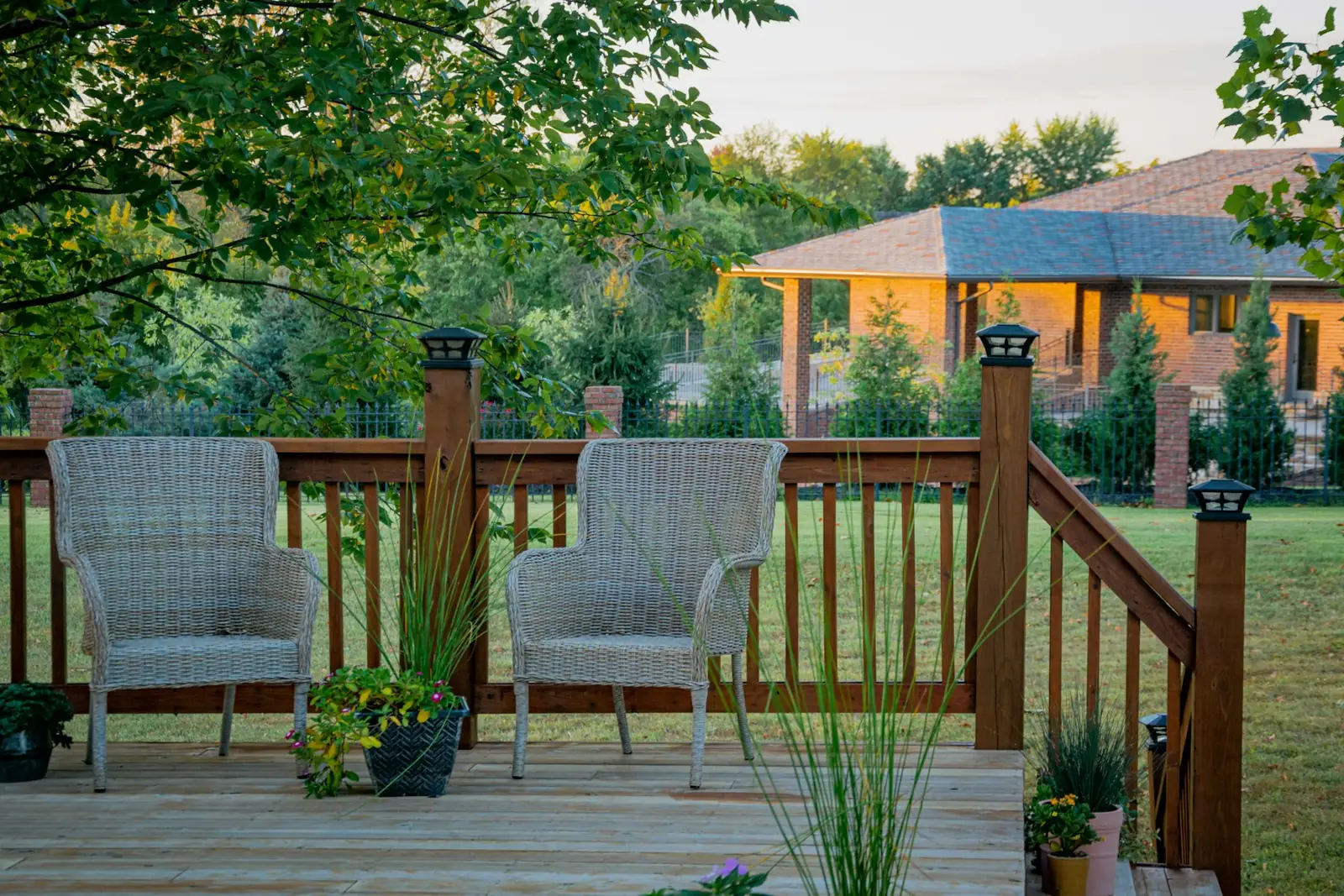 Timber garden decking with outdoor chairs