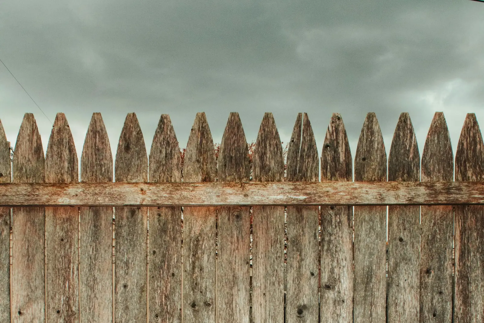 Old weathered wooden fence boards