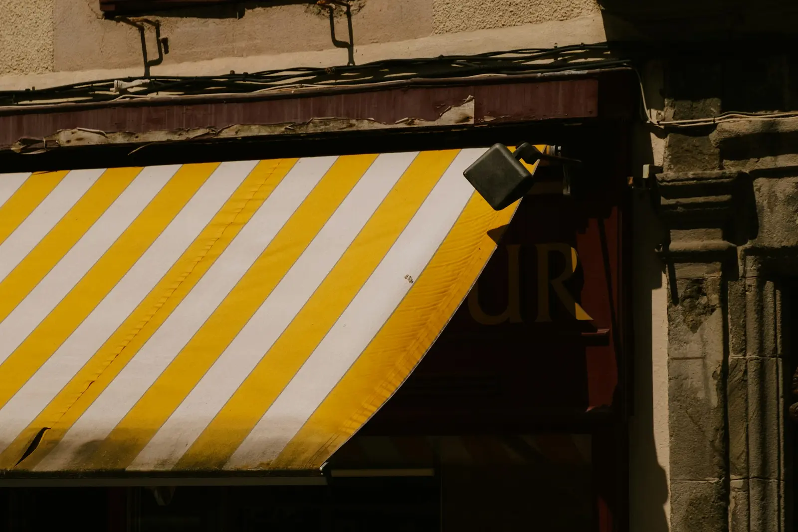 Close-up of a yellow and white striped awning fabric